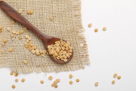 pigeon pea also known as toor dal in wooden spoonの写真素材