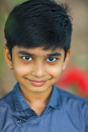 Happy indian child jumping in airの写真素材