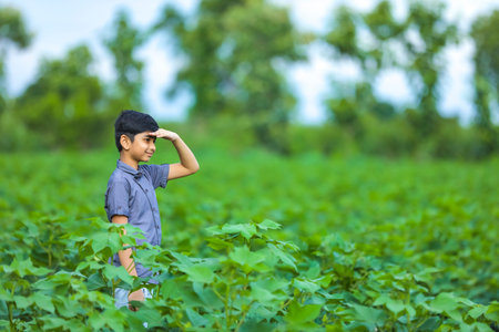Happy indian child jumping in airの写真素材
