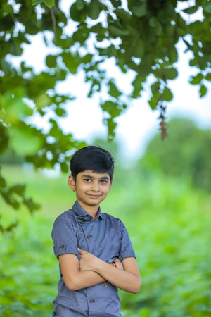 Happy indian child jumping in air