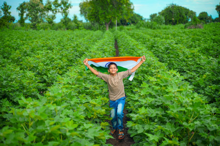 cute little indian boy with tri color balloons and celebrating Independence or Republic day of India