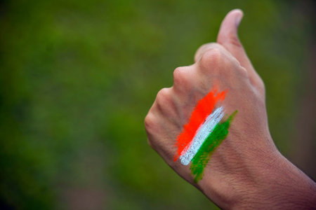 Concept for Indian Independence day and republic day, tricolor on hand