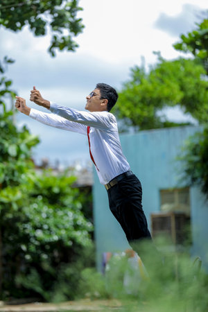 Indian Student achieving success , Jumping in air