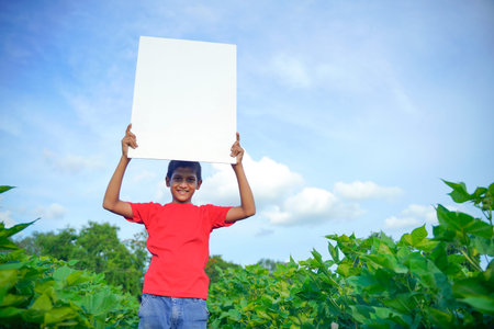 Indian child white board in hand