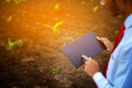 Digital black color tablet in handの写真素材