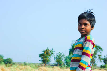 Jalgaon, India - March 17, 2020: Poor indian children playing at field , rural life of Indiaのeditorial素材