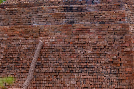Old red brick wall background texture close up