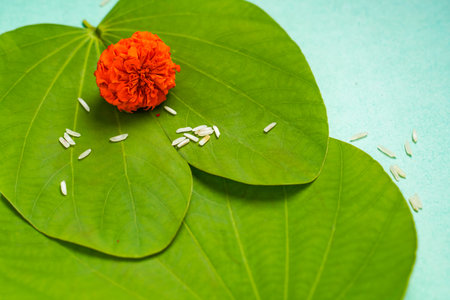 Indian festival dussehra , green leaf, rice and flowers