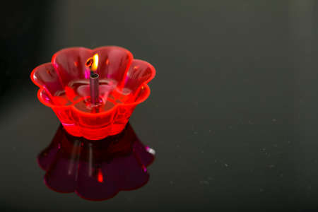 Indian festival diwali , Colorful lamps of oil on dark backgroundの写真素材