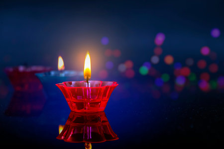 Indian festival diwali , Colorful lamps of oil on dark background