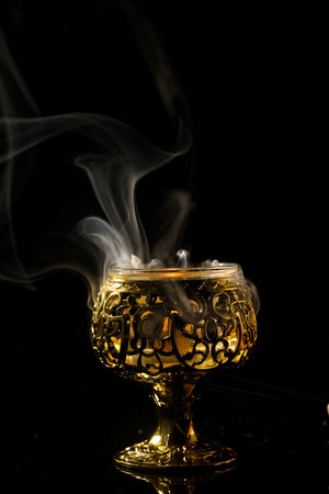 Indian festival diwali , candle on dark background