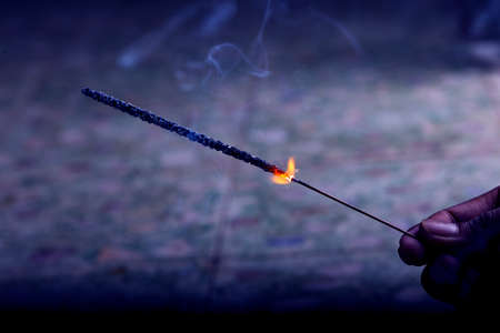 The burning sparklers diwali festival. Celebrating Diwali in india.の写真素材