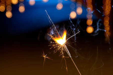 The burning sparklers diwali festival. Celebrating Diwali in india.の写真素材