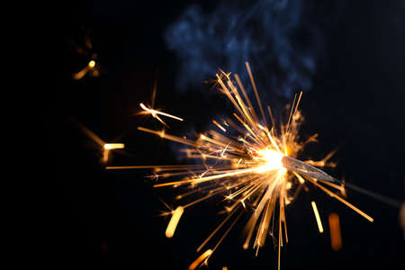 The burning sparklers diwali festival. Celebrating Diwali in india.の写真素材