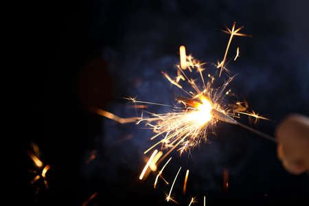 The burning sparklers diwali festival. Celebrating Diwali in india.の写真素材