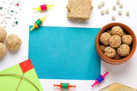 Indian festival makar sankranti concept : Tilgul and sesame seed ball or ladoo with copy spaceの写真素材
