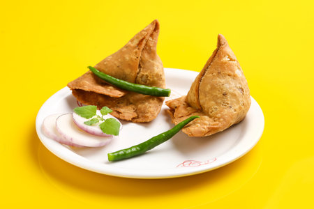 homemade Potato samosa in plate. Famous snacks in india