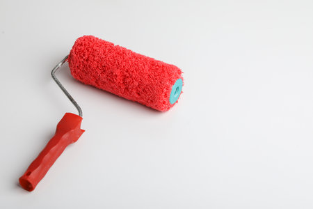 Paint roller brush isolated on white backgroundの写真素材