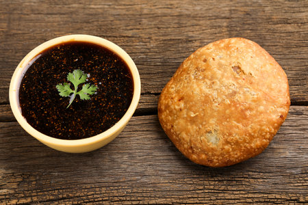 Kachori is a spicy snack from India also spelled as kachauri and kachodi. Served with tomato ketchup. Favorite Tea time snacksの写真素材