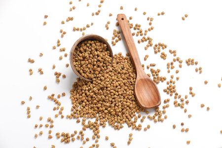 Dried chickpeas in bowl isolated on white background.の写真素材