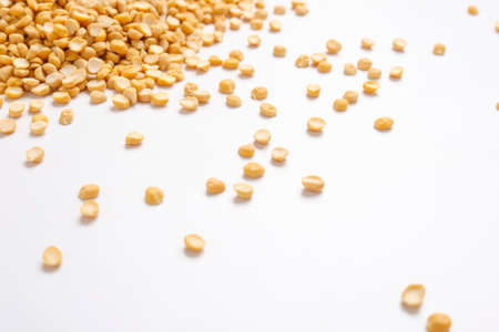 Dried chickpeas pulses in bowl isolated on white background.の写真素材