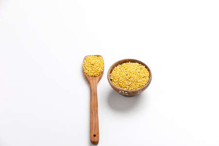 yellow moong mung dal lentil pulse bean on white background.の写真素材