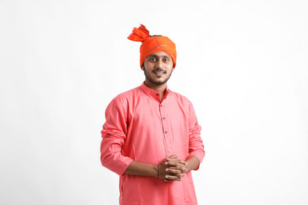 Young indian farmer on white background