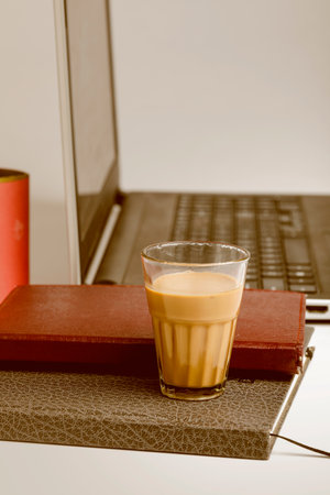 Laptop and Diary with cup of tea. work from home conceptの写真素材