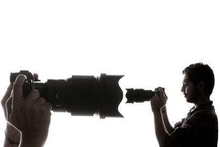 Photographer With Camera on white background.