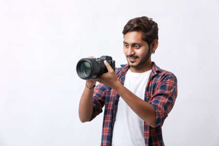 Photographer With Camera on white background.の写真素材