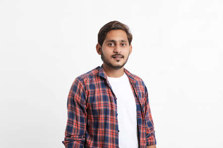 Indian or Asian man giving multi pal expression over white backgroundの写真素材