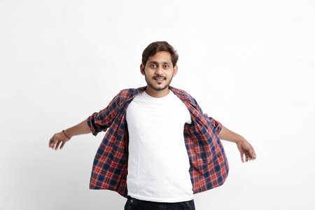 Indian or Asian man giving multi pal expression over white backgroundの写真素材