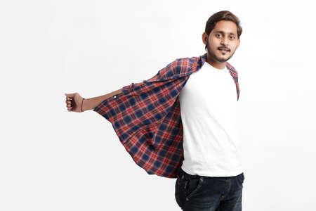 Indian or Asian man giving multi pal expression over white backgroundの写真素材