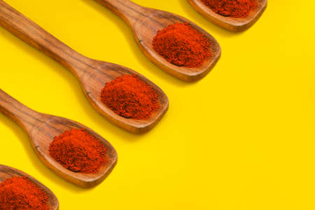 Chili powder in wooden spoonの写真素材