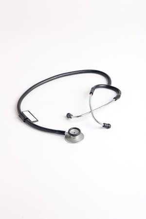 Black stethoscope on whiteの写真素材
