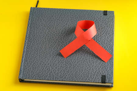 Medical diary with red ribbonの写真素材