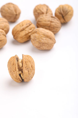 Walnuts and cracked walnutの写真素材