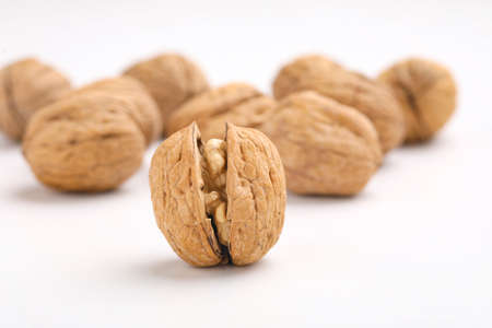 Walnuts and cracked walnutの写真素材