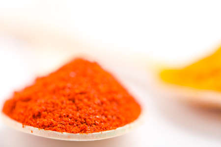 Red chili powder in spoonの写真素材