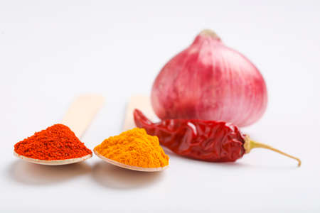 Spices ingredient Onion,Red chili powder and turmeric powderの写真素材