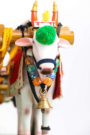 Traditional Indian wooden bull cart and statue of farmer sitting on bull cartの写真素材