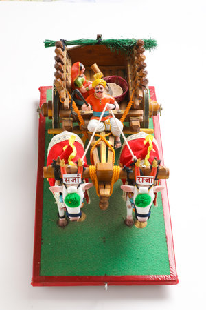 Traditional Indian wooden bull cart and statue of farmer sitting on bull cartの写真素材
