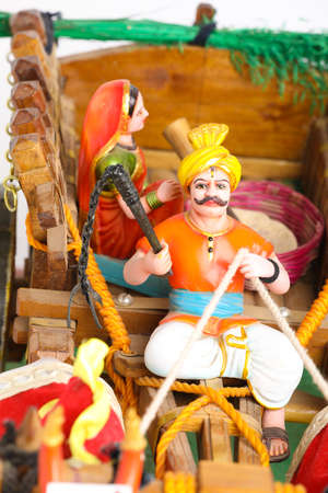 traditional Indian wooden bull cart and statue of farmers couple sitting on bull cartの写真素材