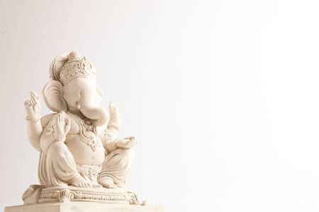 Statue of Lord Ganesha without color on whiteの写真素材