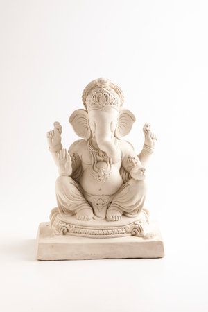 Statue of Lord Ganesha without color on whiteの写真素材