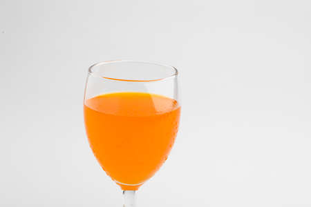 Orange juice glassの写真素材