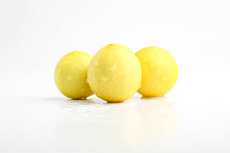 Fresh Yellow lemon on whiteの写真素材