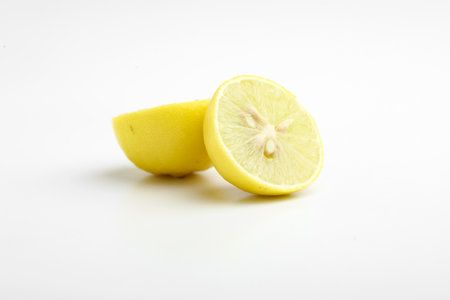 Fresh Yellow lemon on whiteの写真素材