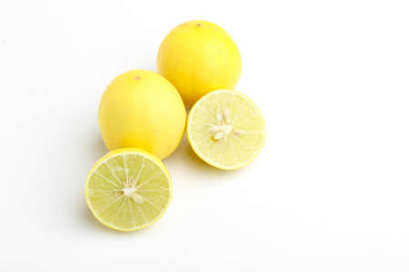 Fresh Yellow lemon on whiteの写真素材