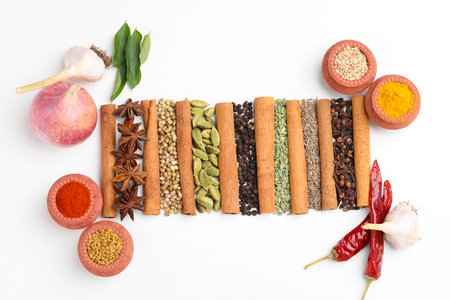 Indian spices and herbs on white background.の写真素材